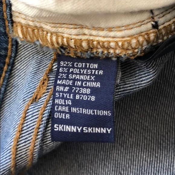 • Madewell • Skinny Skinny Distressed Jeans 24