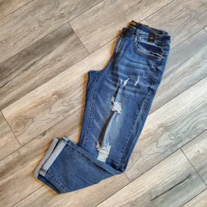   Mid Rise Distressed Skinny Jeans
