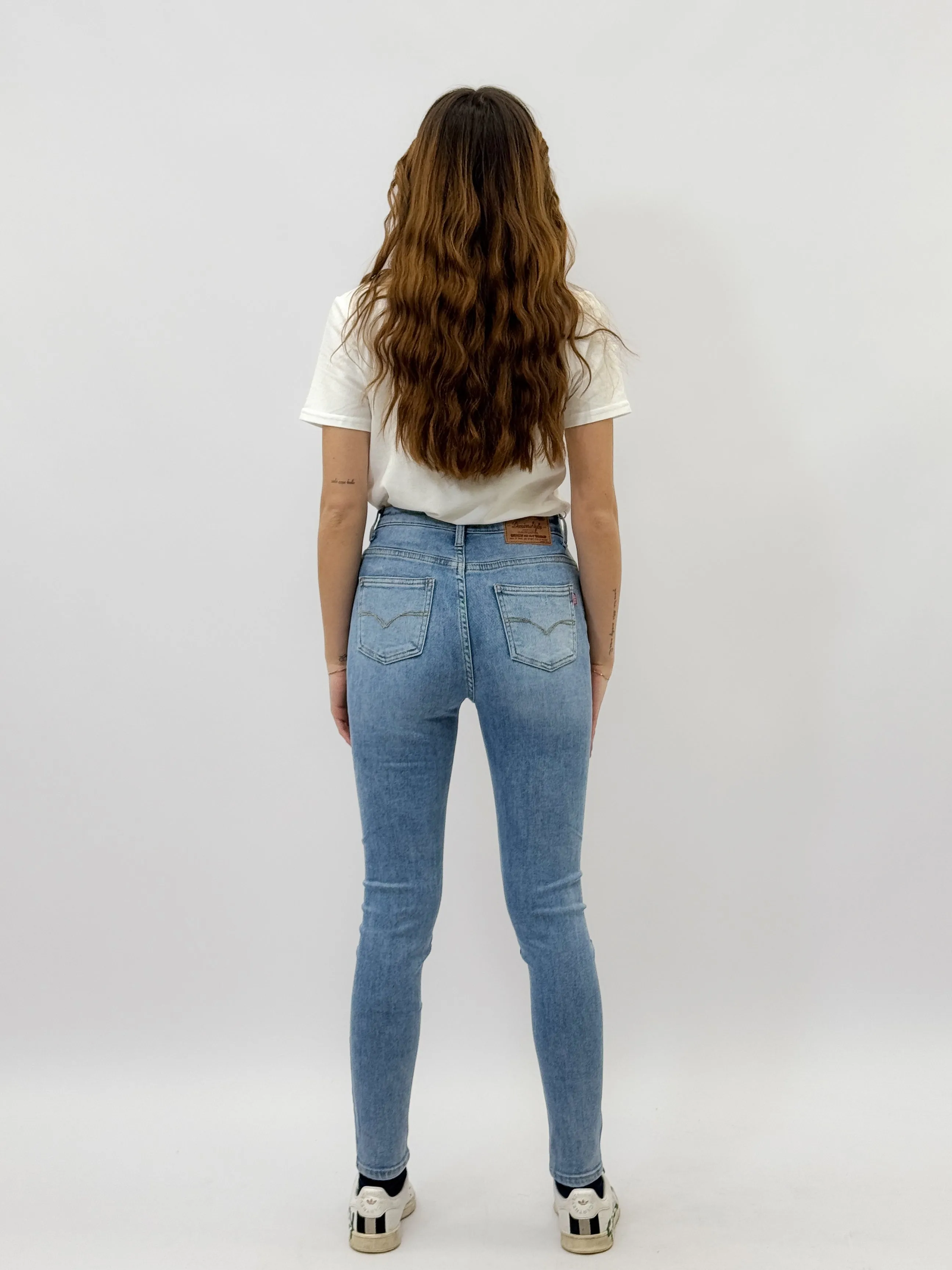 Pantaloni jeans super skinny vita alta