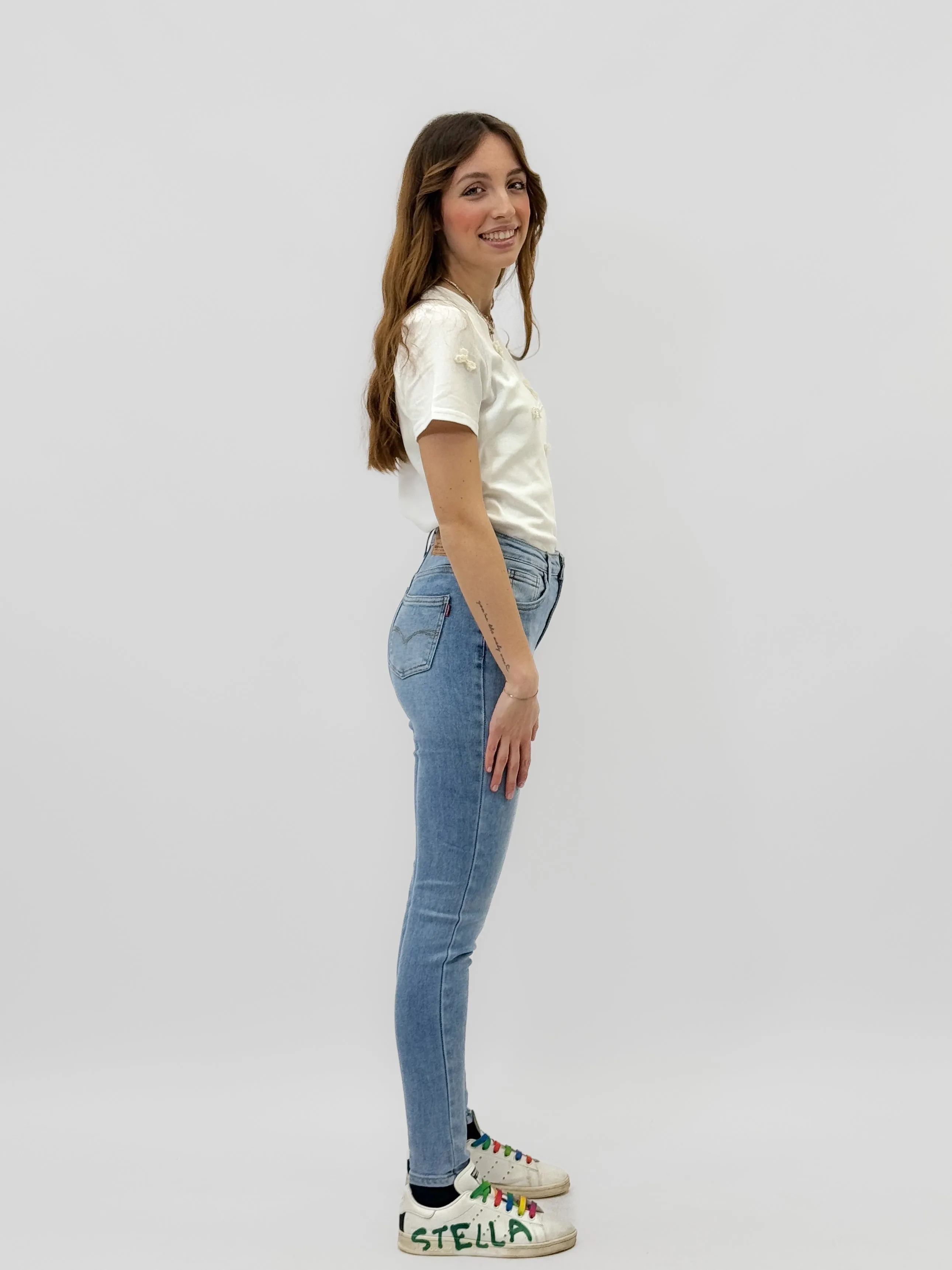 Pantaloni jeans super skinny vita alta