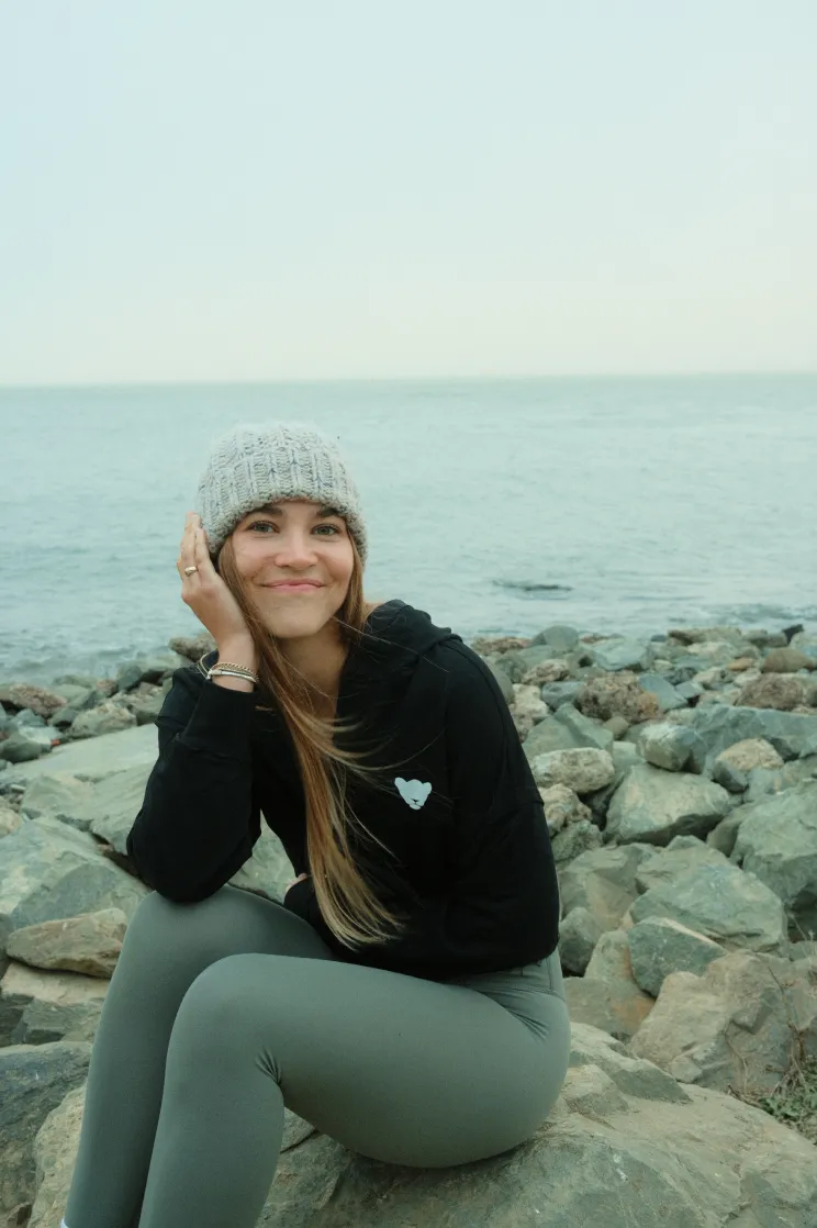 the Rise & Glow crop hoodie