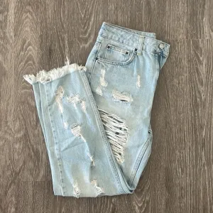 Topshop Ripped Straight Legged Jeans